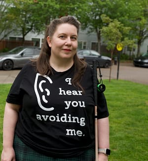 Desiree Christian, Wearing a T-shirt she designed that says, "I hear you avoiding me"